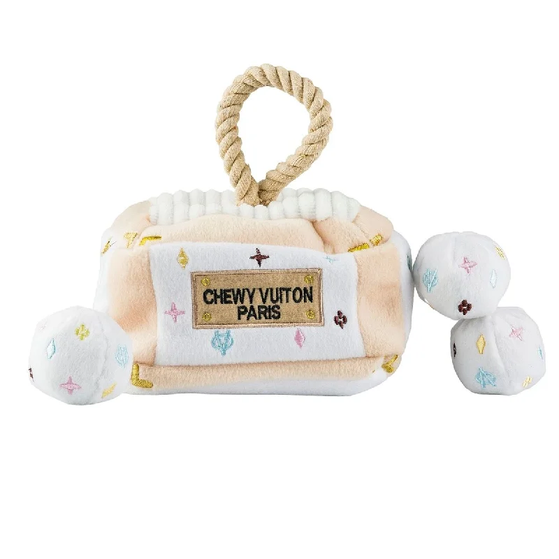 - Recommended affordable pet toysWhite Chewy Vuiton Trunk Activity House Dog Toy